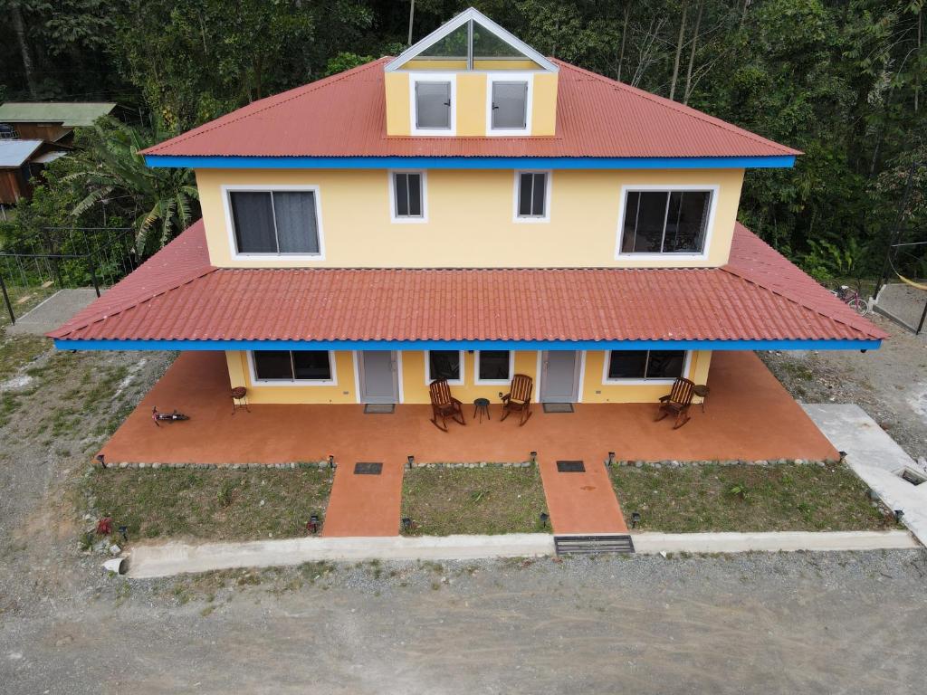 an aerial view of a house with a red roof at The Spot @ Cocles in Puerto Viejo