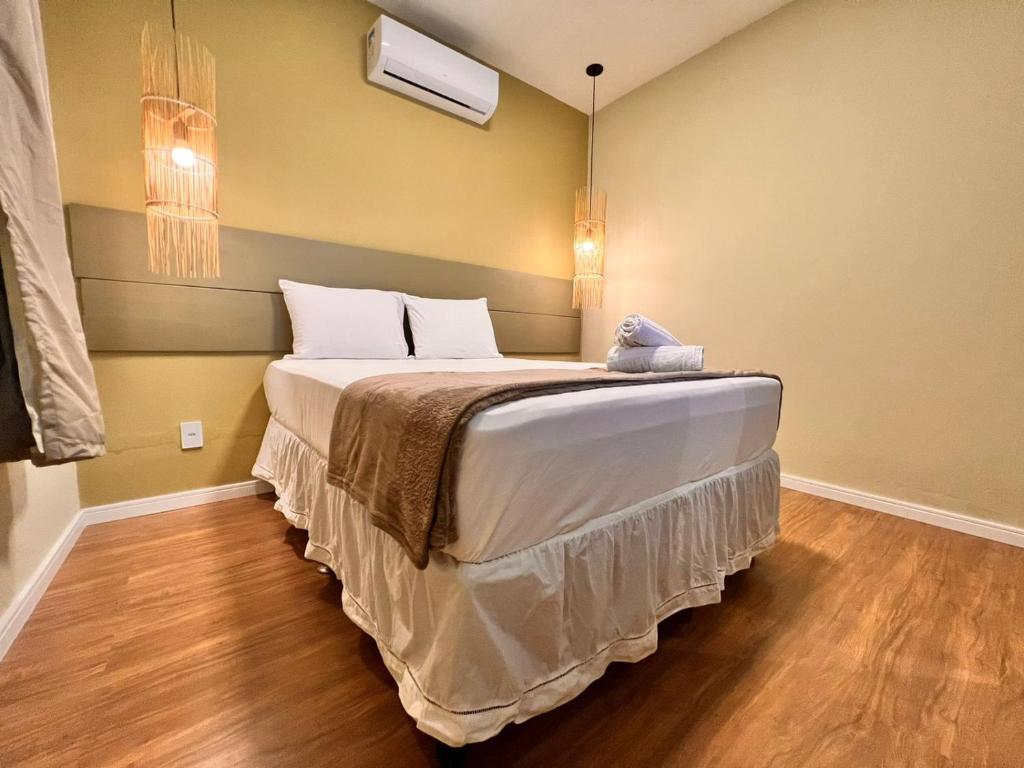 Säng eller sängar i ett rum på Kaçuá Milagres