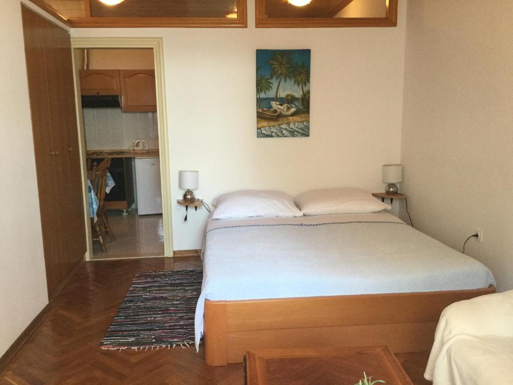 Posteľ alebo postele v izbe v ubytovaní Apartments by the sea Podstrana, Split - 15428