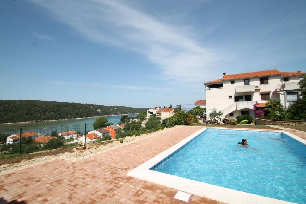Family-friendly apartments with swimming pool Kampor, Rab - 15518