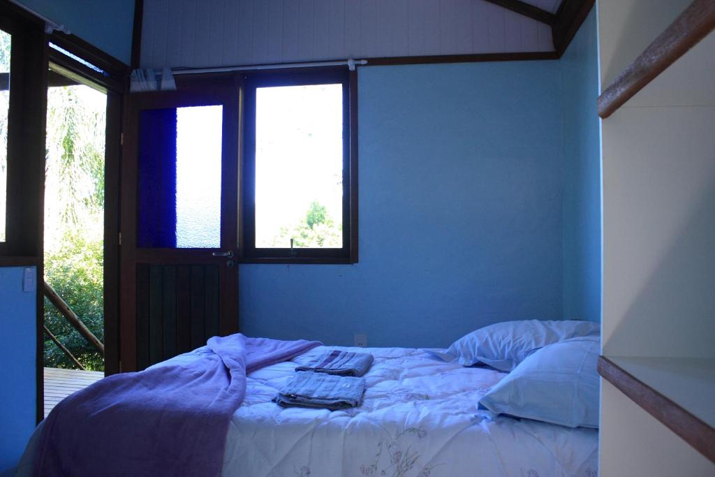 A bed or beds in a room at Aruna Eco Spa