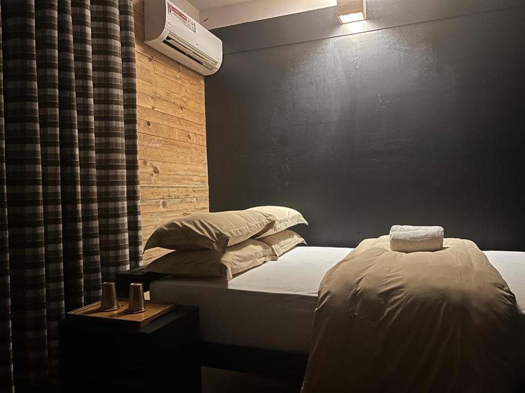 Voodi või voodid majutusasutuse Gusto Accommodation toas