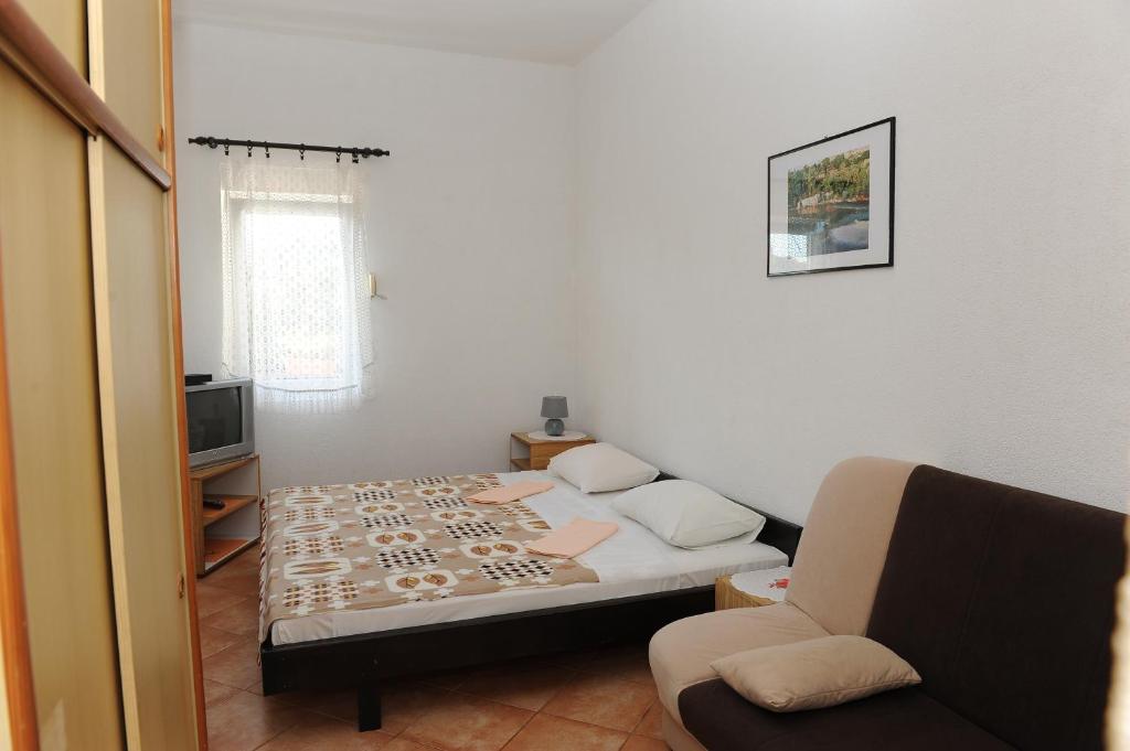 Postel nebo postele na pokoji v ubytování Apartments with parking spaces Podaca, Makarska - 15748