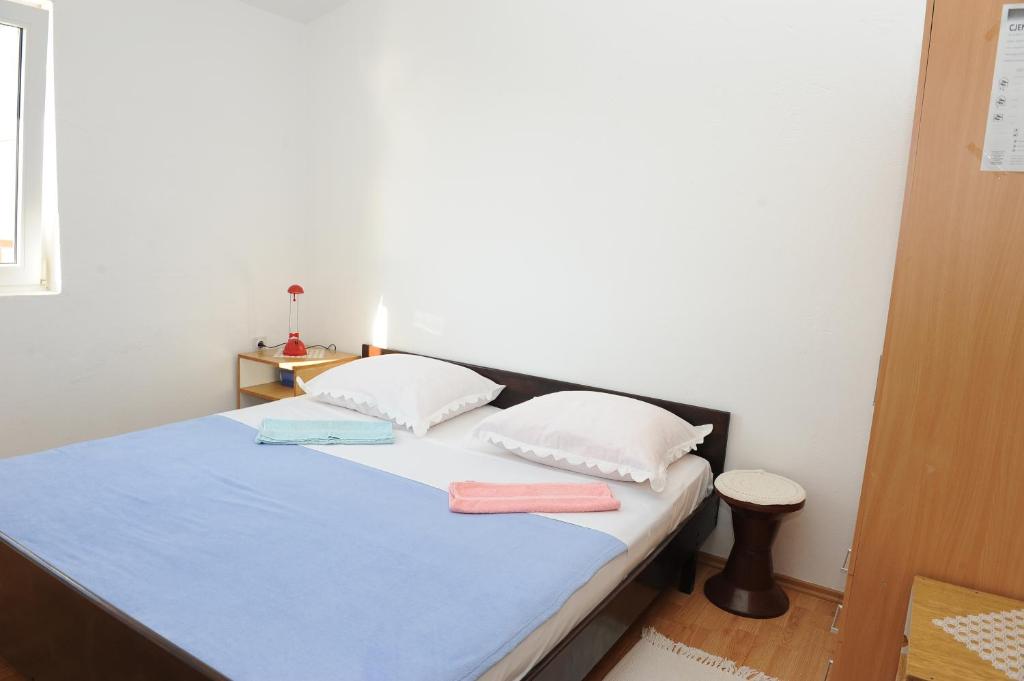 Postel nebo postele na pokoji v ubytování Apartments with parking spaces Podaca, Makarska - 15748