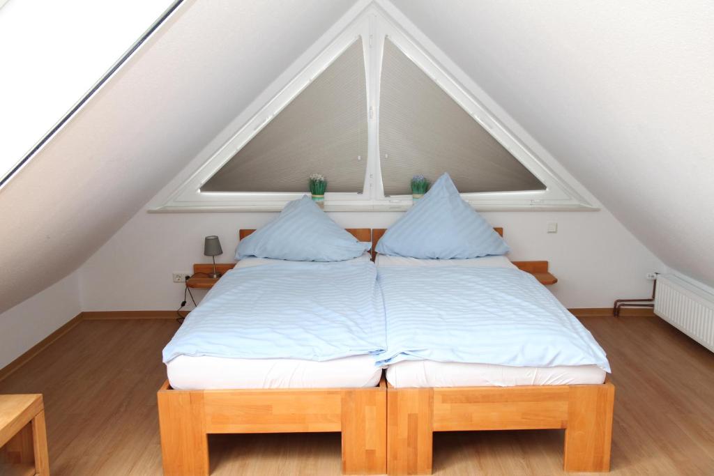Postel nebo postele na pokoji v ubytování Keno