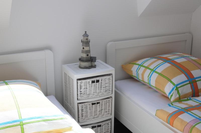 Postel nebo postele na pokoji v ubytování Silke