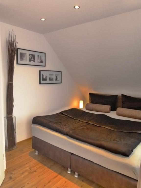 Postel nebo postele na pokoji v ubytování Achterblick