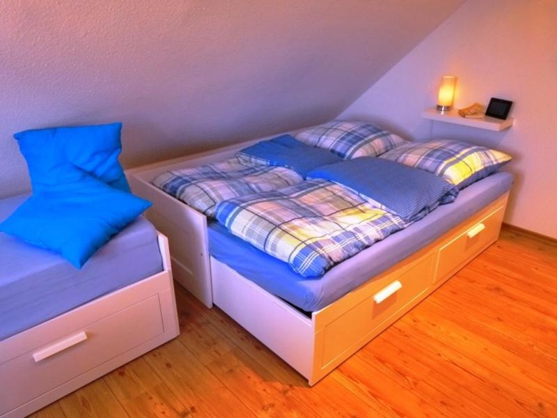 Postel nebo postele na pokoji v ubytování Achterblick