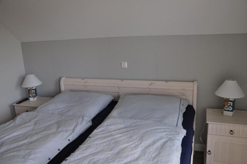Postel nebo postele na pokoji v ubytování GrachtenFlair