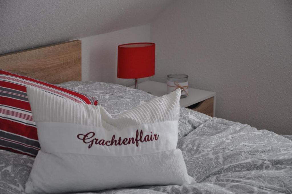 Postel nebo postele na pokoji v ubytování GrachtenFlair