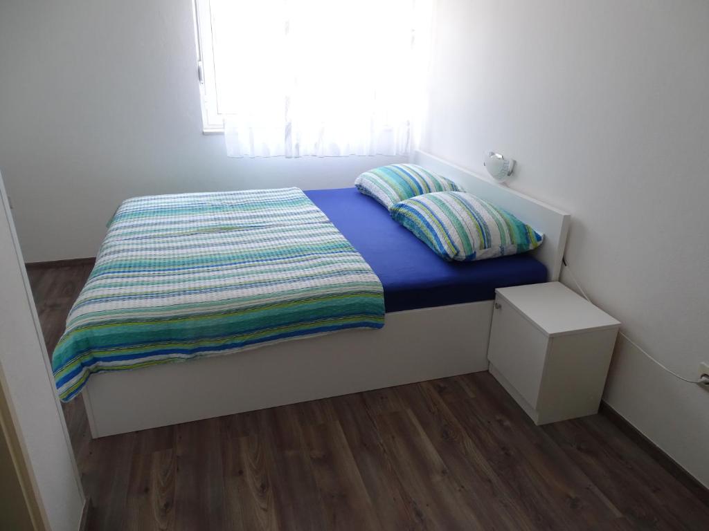 Postel nebo postele na pokoji v ubytování Apartments with a parking space Bibinje, Zadar - 16155