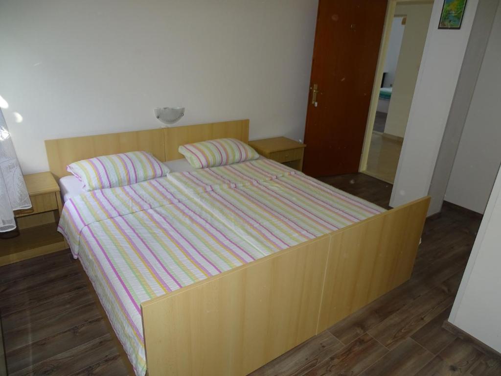 Postel nebo postele na pokoji v ubytování Apartments with a parking space Bibinje, Zadar - 16155