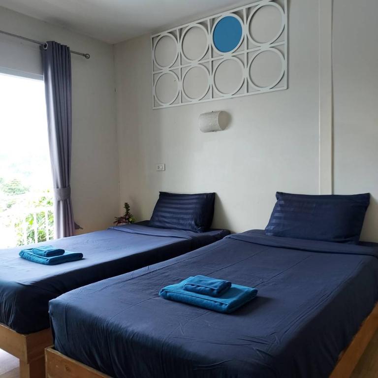 Llit o llits en una habitació de Blue View House Phi Phi