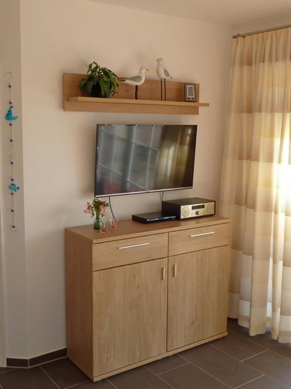 TV a/nebo společenská místnost v ubytování Heubude