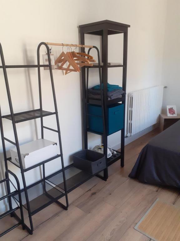 Postel nebo postele na pokoji v ubytování chambre au calme haute ville