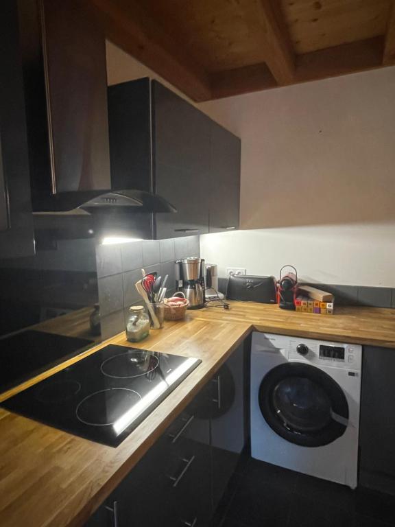 Kuchyň nebo kuchyňský kout v ubytování Chalet le Lotus Blanc