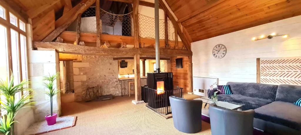 Χώρος καθιστικού στο Gîte Atypique 2 à 8 PERSONNES avec piscine jacuzzi proche châteaux de la Loire