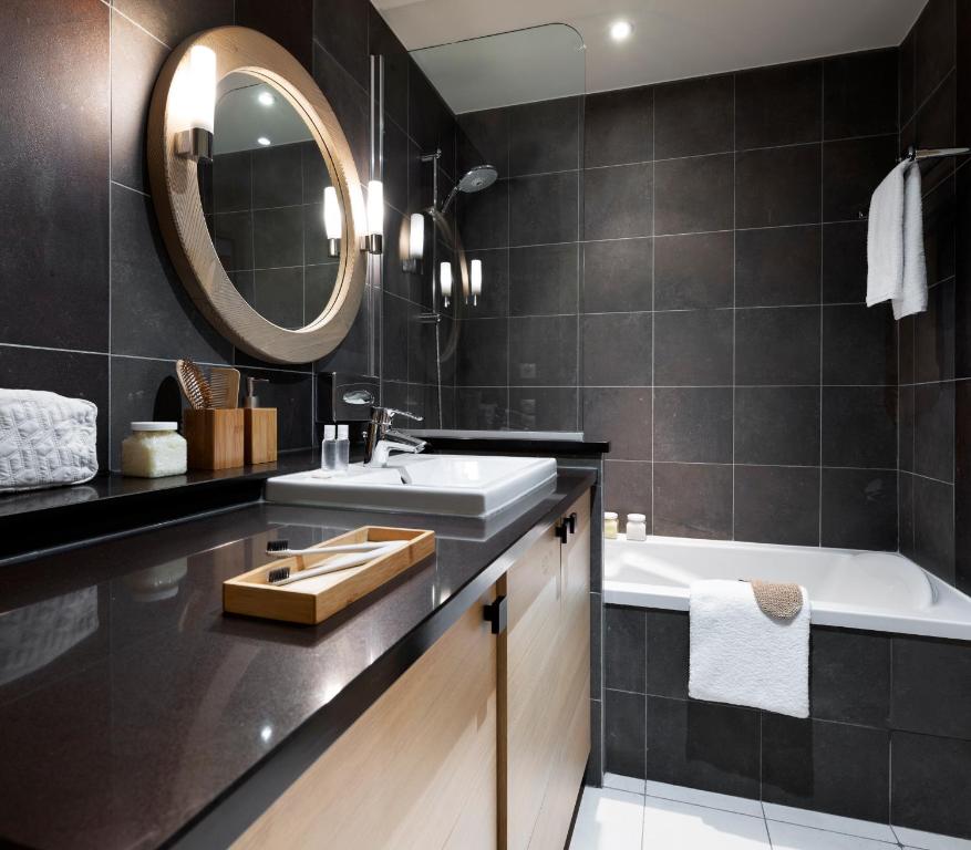 Koupelna v ubytování Résidence Pierre & Vacances Premium L'Amara