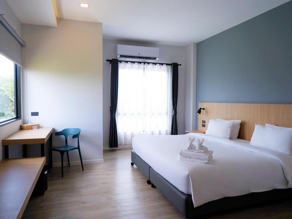 bliQ Hotel Chanthaburiにあるベッド