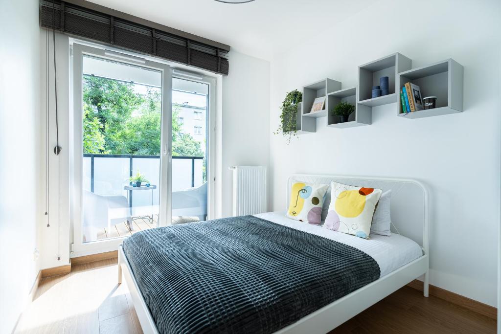 Postel nebo postele na pokoji v ubytování Pure Rental Apartments Inżynierska