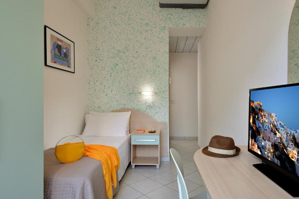 TV a/nebo společenská místnost v ubytování Hotel Romagna