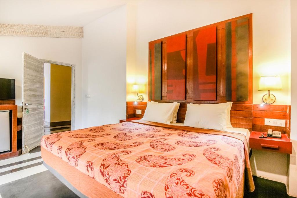Postel nebo postele na pokoji v ubytování Casa Vagator
