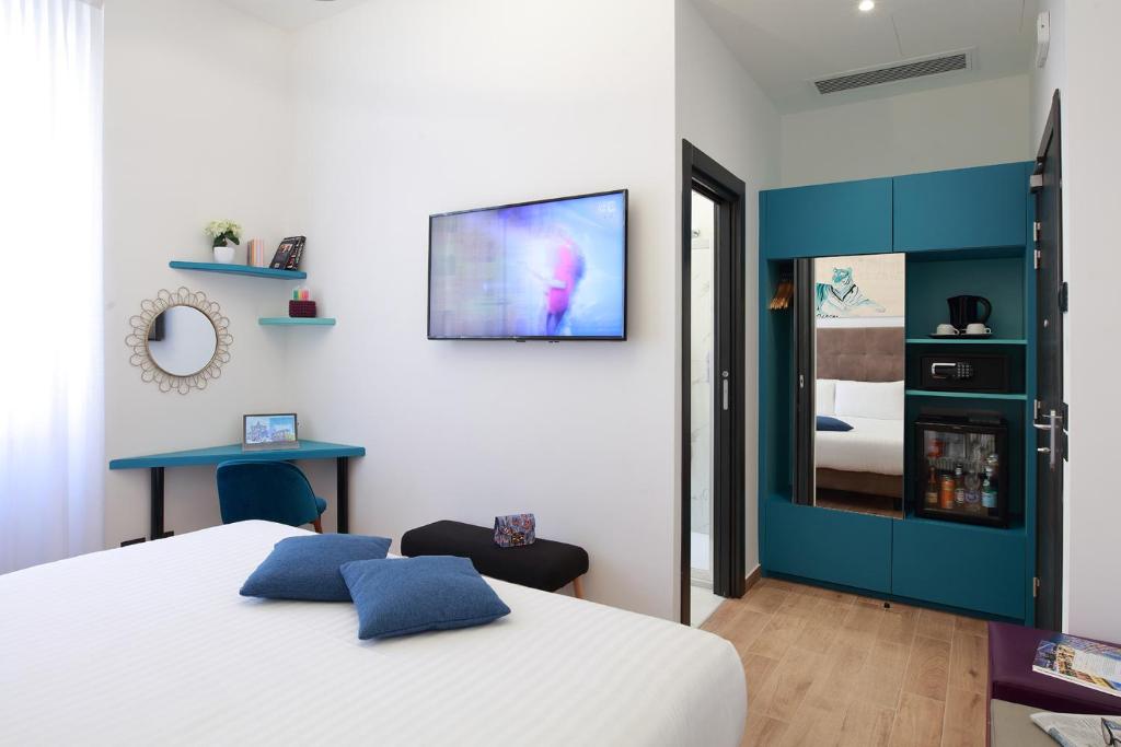 Postel nebo postele na pokoji v ubytování Hotel Sanpi Milano