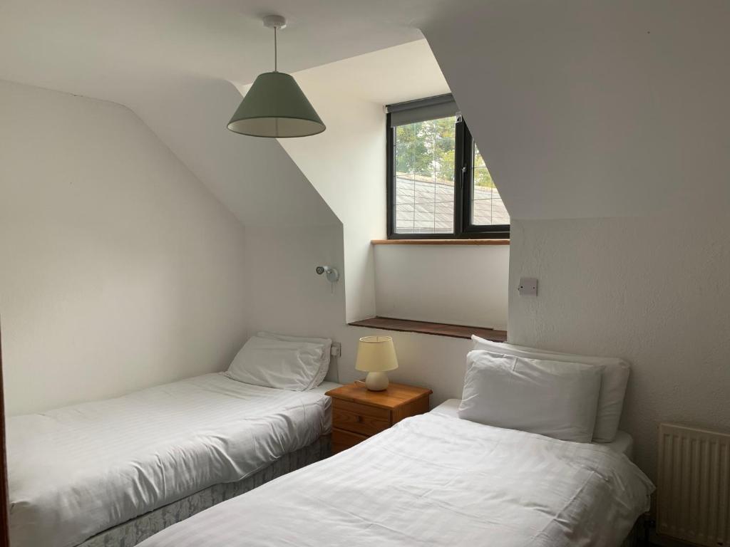 Postel nebo postele na pokoji v ubytování Killeena House