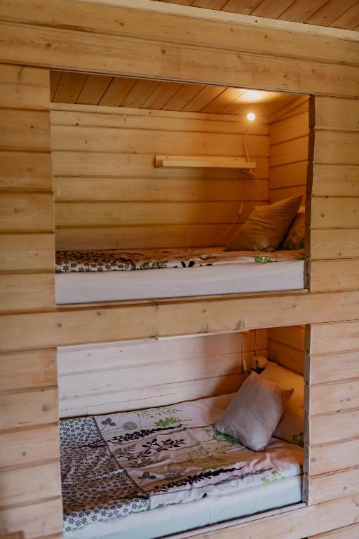 Posteľ alebo postele v izbe v ubytovaní Zam-zam apartmanok
