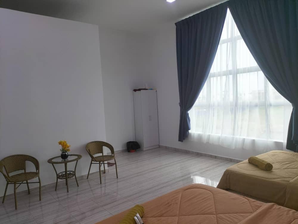 Posezení v ubytování Kangar Jaya Lodging
