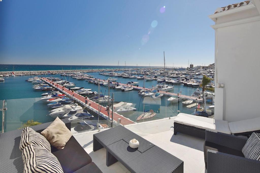 a view of a marina with boats in the water at 306 -Luxury Selection- Puerto Banus Marbella Front Line Penthouse in Marbella