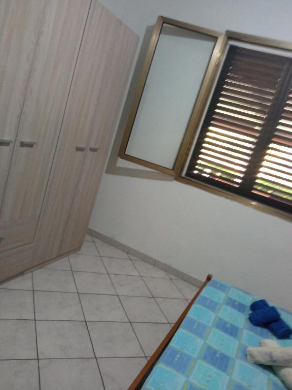 Posteľ alebo postele v izbe v ubytovaní Casa ninuccia Cardedu