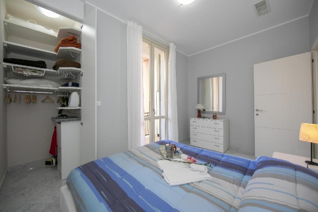 Posteľ alebo postele v izbe v ubytovaní Appartamento Giulia - Alassio