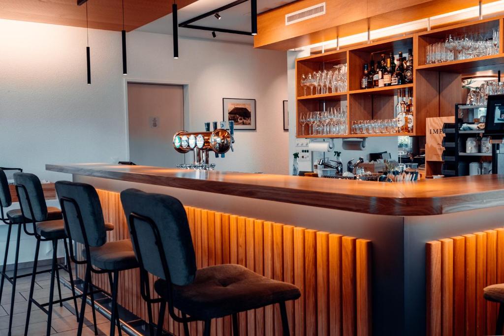 Lounge nebo bar v ubytování Hotel Rössli Luterbach