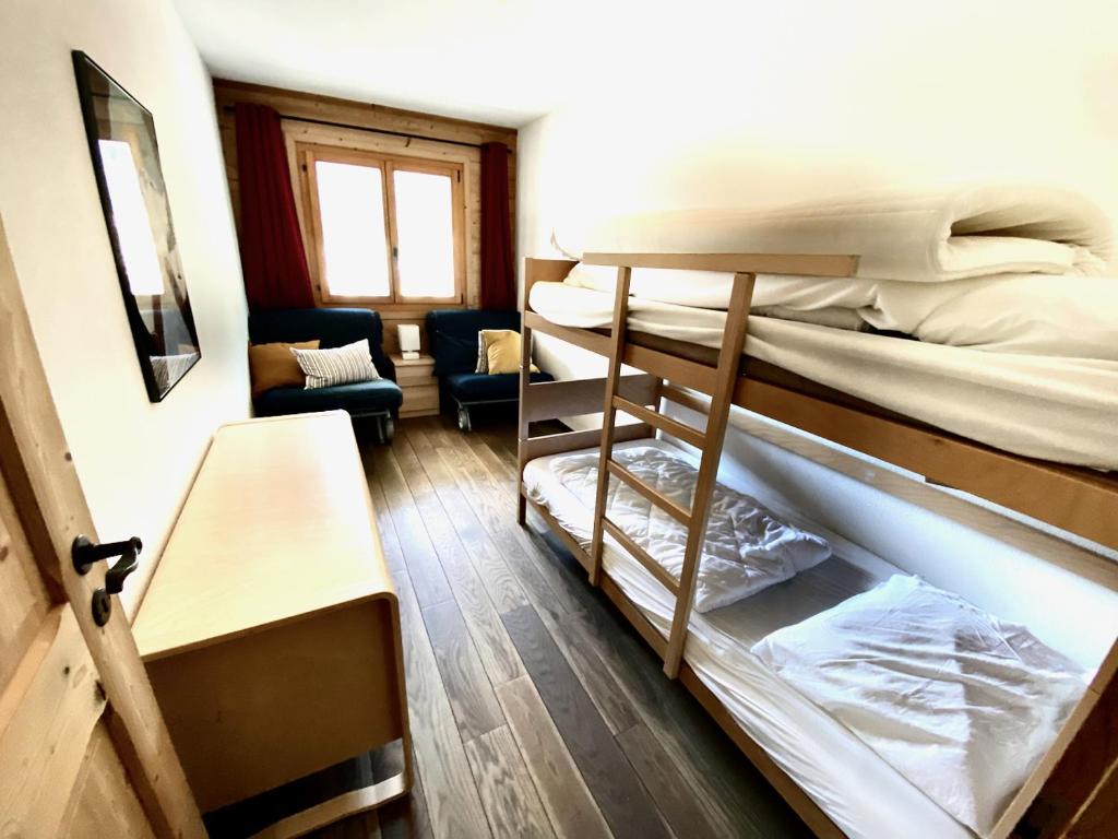 Postel nebo postele na pokoji v ubytování Chalet Les Dalton, Morgins