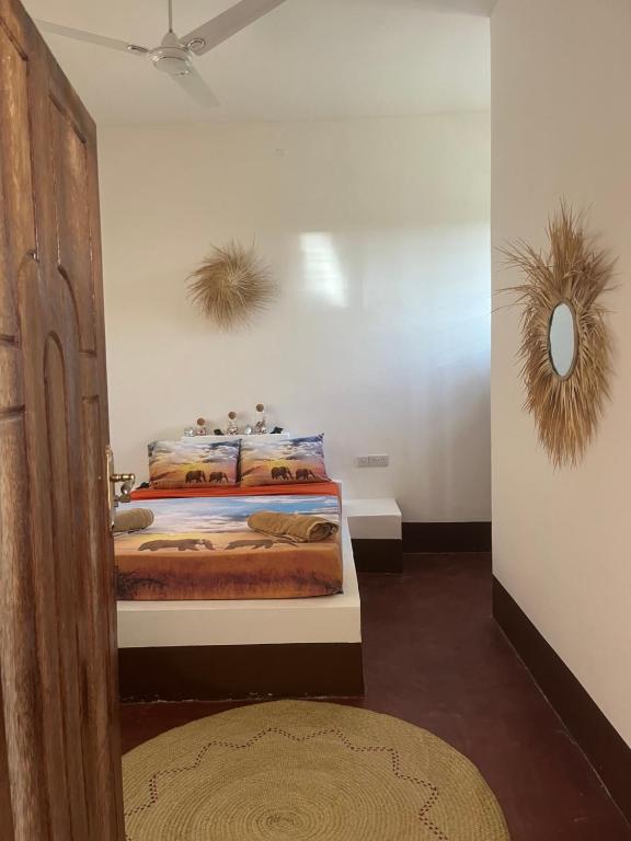 Postel nebo postele na pokoji v ubytování Habibi B&B