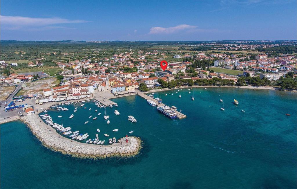 an aerial view of a harbor with boats in the water at Nice Apartment In Fazana With 2 Bedrooms in Fažana