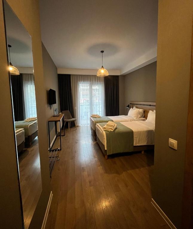 Letto o letti in una camera di Hotel Stancia Kazbegi - City Center