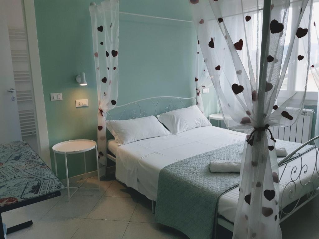 Postel nebo postele na pokoji v ubytování Nonna Anita Palace Narni