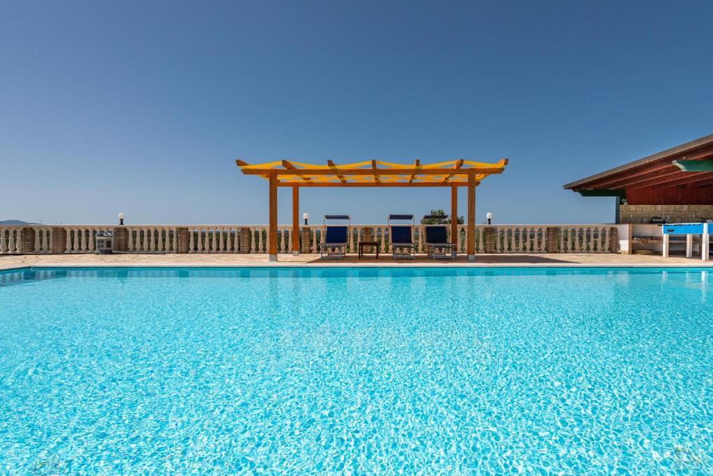 Villa Wollow a Sant'Anna Arresi - Elegante Villa Vista Mare