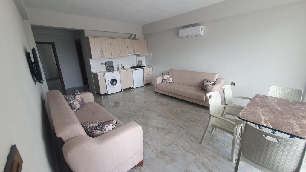Kuchyň nebo kuchyňský kout v ubytování Olive Tree Apart Hotel