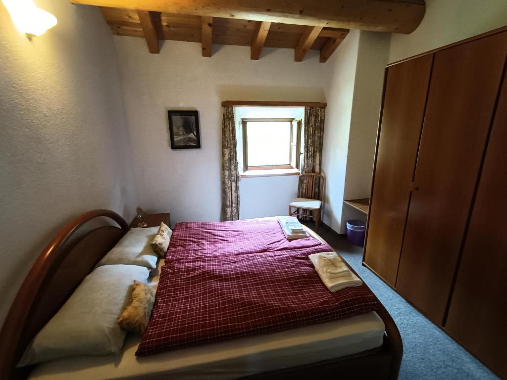 Postel nebo postele na pokoji v ubytování Albergo Ristorante Selva