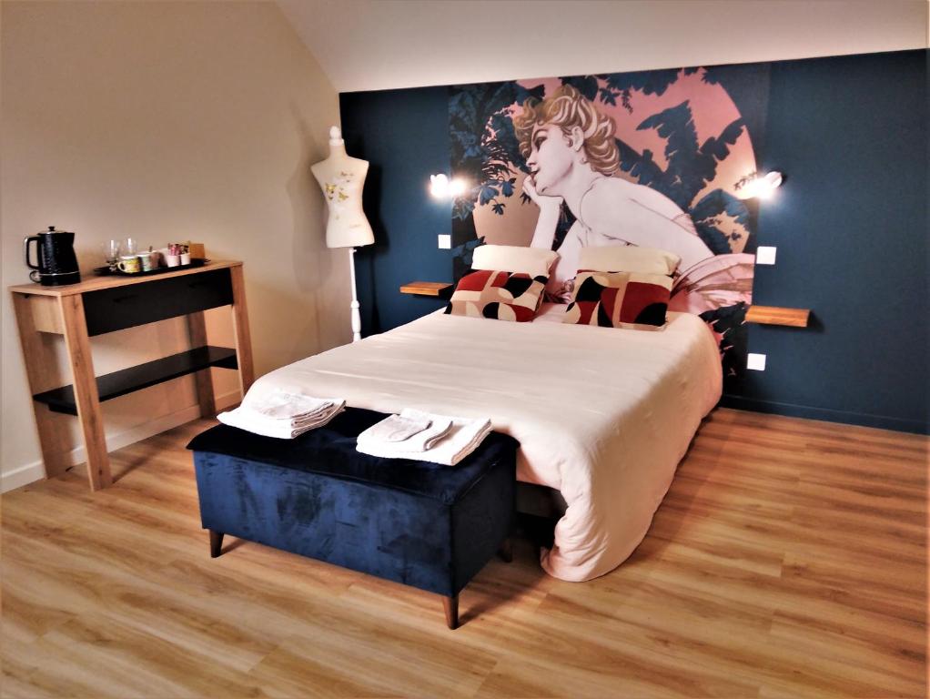 Postel nebo postele na pokoji v ubytování Le Penty de Nalzu