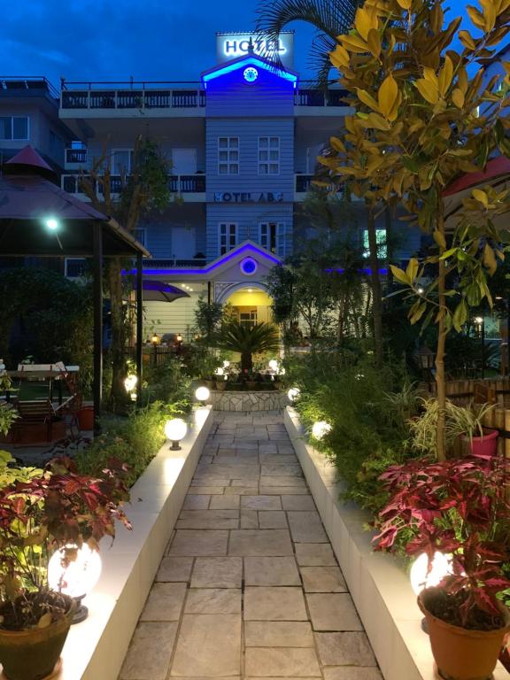 a walkway in front of a hotel at night at Hotel ABC, Boutique Hotel in Pokhara in Pokhara