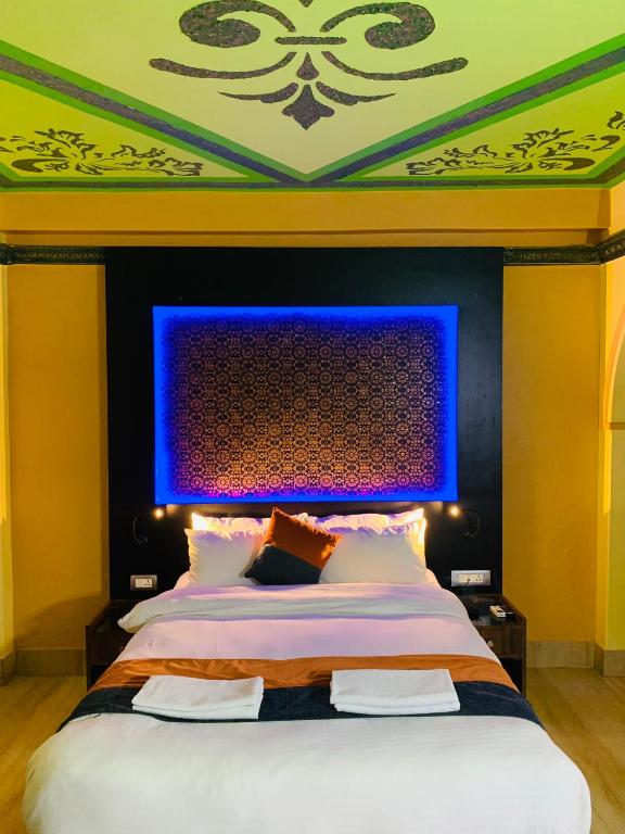 Postel nebo postele na pokoji v ubytování Hotel ABC, Boutique Hotel in Pokhara