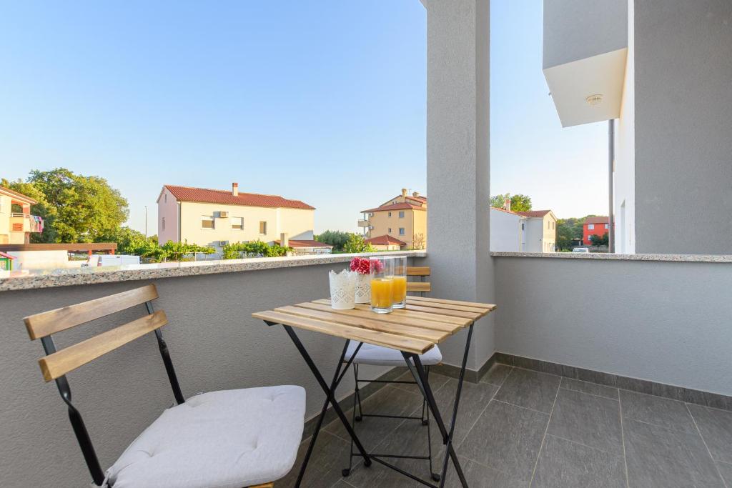 Balkón nebo terasa v ubytování Apartmani Vita, Ližnjan - apartman 1
