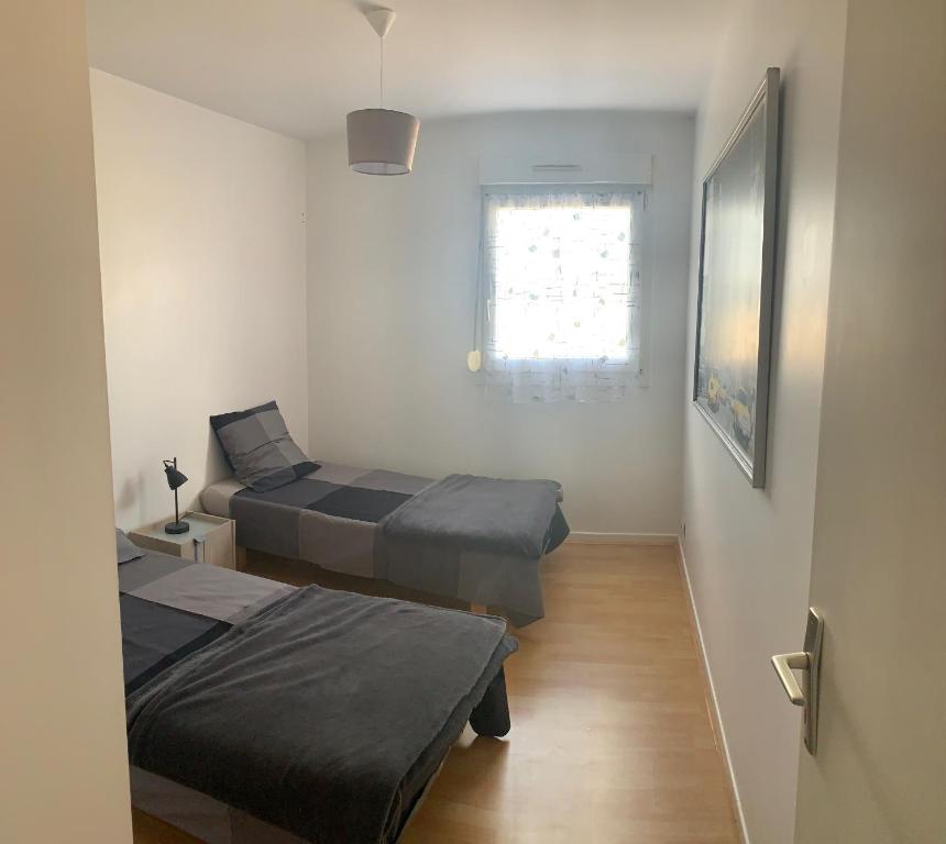 Maison cosy - Three-Bedroom House