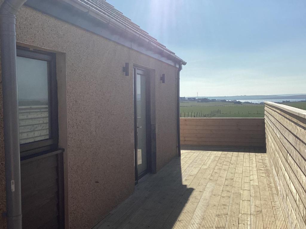 A balcony or terrace at Loanside Lodge, Self-Catering, Holm, Orkney.