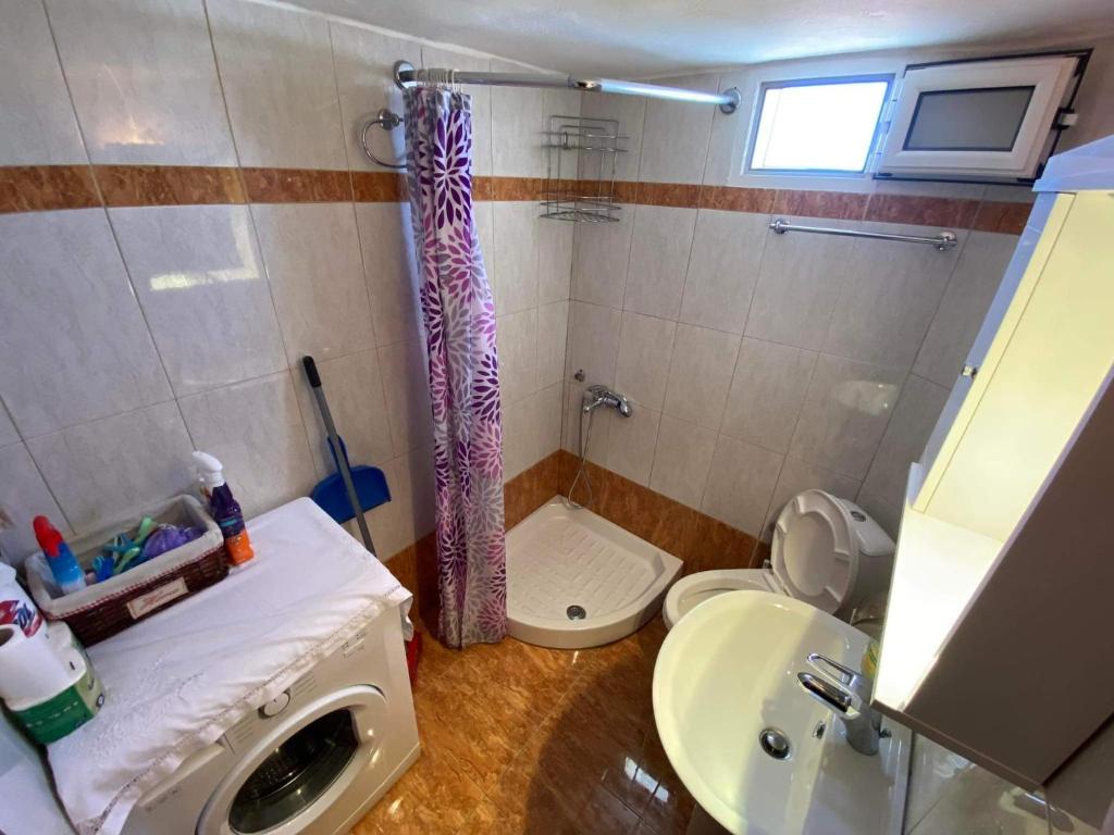 Een badkamer bij GIANNIS-KLEOPATRA HOUSE 1
