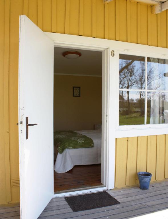 Postel nebo postele na pokoji v ubytování Gula Hönan Guest House